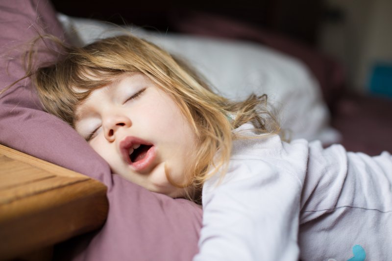Child with sleep apnea sleeping