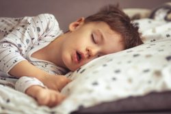 Child snoring, possibly because of secondhand smoke and sleep apnea in Melbourne