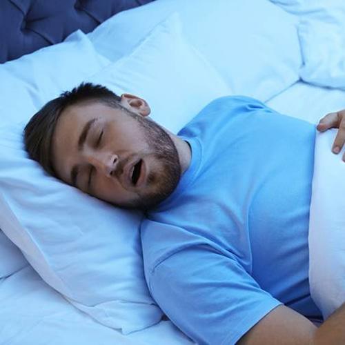 Snoring man who may have obstructive sleep apnea in Boca Raton