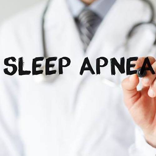 Doctor writing “sleep apnea” in black marker